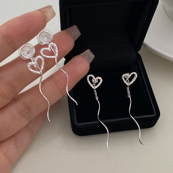 Long Asymmetric Hollow Wave Ear Clips – Light Luxury & Versatile Design